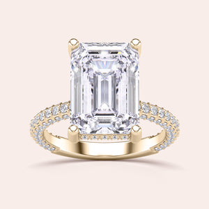 Exquisite pear-shaped diamond ring in 14K/18K gold or platinum, adorned with halo diamond accents for an elegant touch.
