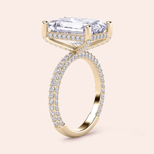 Exquisite pear-shaped diamond ring in 14K/18K gold or platinum, adorned with halo diamond accents for an elegant touch.