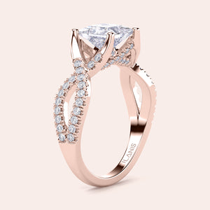 Elegant 14K or 18K rose gold engagement ring with a heart-shaped diamond and a twisted diamond band, not worn on model.