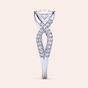 "14K white gold Myla ring set with princess-cut diamonds and twisted pave band, perfect for elegant engagements.