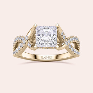 Elegant 14K gold Myla princess twisted band ring with diamond accents, featuring a radiant cut diamond center stone by ILANIS.