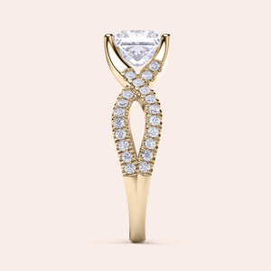 Elegant 14K gold engagement ring with a twisted band, featuring small round diamonds and a stunning center diamond, on a neutral backdrop.