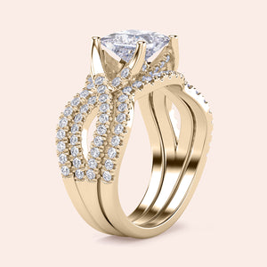 Elegant 14K gold twisted ring set with asscher cut diamond and round diamonds, perfect for engagement or special occasions.