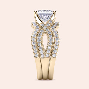 "Luxurious 14K yellow gold diamond ring set with a triangle-shaped diamond and elegant curved bands, perfect for sophistication."