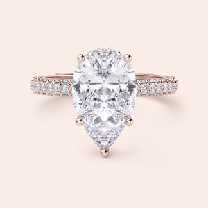 Rose Gold pear-shaped diamond engagement ring withPave band, available in 14K/18K gold or platinum, features an exquisite centerpiece.