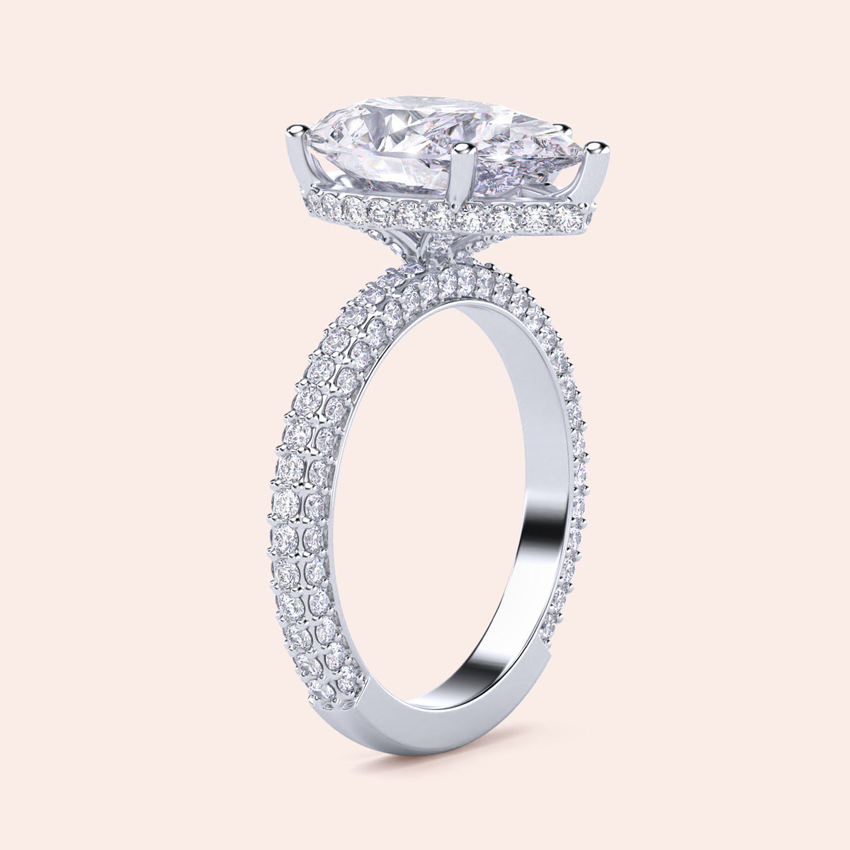 Elegant 14K or 18K white gold engagement ring featuring a pear diamond and halo accents, embellished with pave-set diamonds.