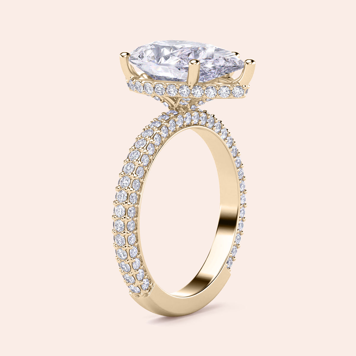 Elegant 14K yellow gold engagement ring with pear hidden halo, accented byPave diamonds for brilliant sparkle.