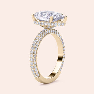 Elegant 14K yellow gold engagement ring with pear hidden halo, accented byPave diamonds for brilliant sparkle.