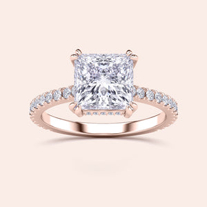 Rose Gold 14K Engagement Ring with Radiant Cut Diamond in Pave Setting, featuring an elegant hidden halo, not worn on model.