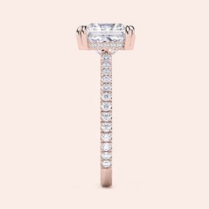 Elegant rose gold engagement ring with emerald-cut diamond and round accents, available in 14K, 18K, or platinum options.