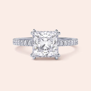 Elegant princess-cut diamond engagement ring with a pave band, available in 14K, 18K gold, or platinum.