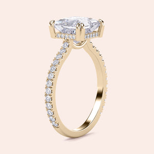 Elegant yellow gold engagement ring featuring a marquise-cut diamond andPave band, available in 14K, 18K, or platinum.
