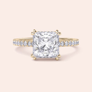 Elegant princess-cut diamond engagement ring in 14K or 18K gold, featuring a halo and pave band for enhanced brilliance.
