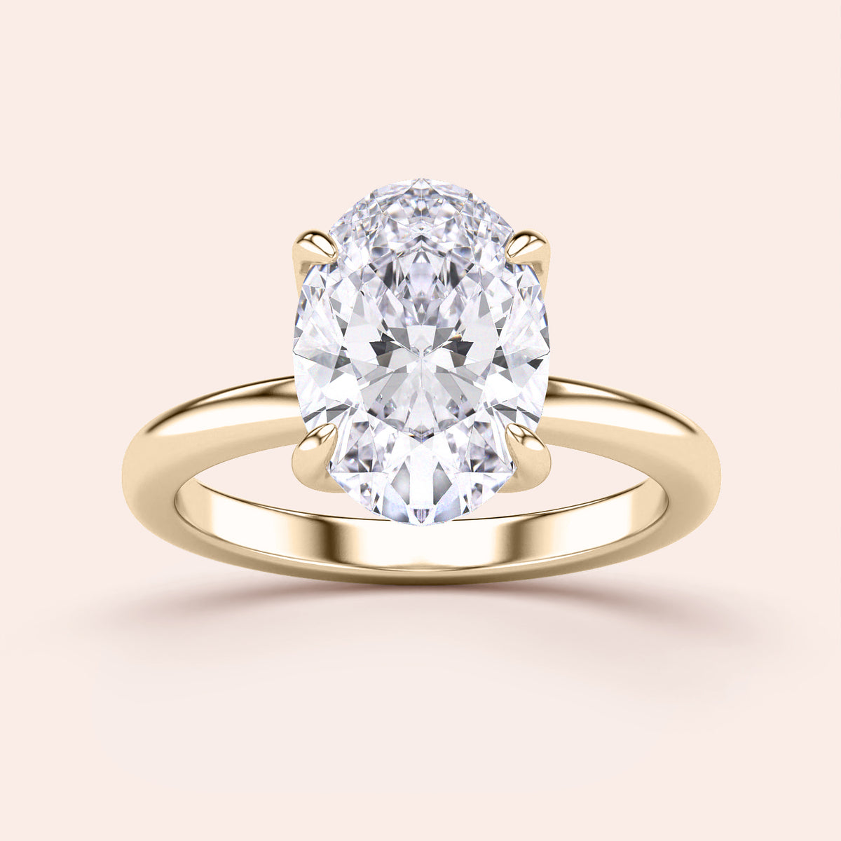 "Elegant oval tulip mount solitaire ring in 14K yellow gold, featuring a timeless design for engagement or special occasions."