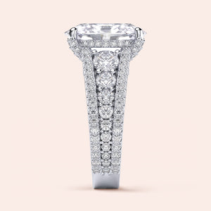 Elegant 14K white gold engagement ring with oval hidden halo accents and three-row band, showcasing stunning diamond details.