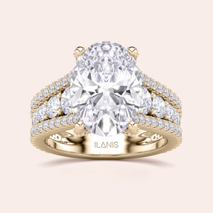 Exquisite 14K Yellow Gold engagement ring featuring an oval diamond and halo accents, crafted with luxurious precision by ILANIS.