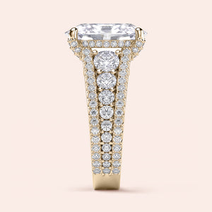 Luxurious emerald-cut diamond engagement ring in 14K yellow gold with hidden halo and three rows of round diamonds, showcasing brilliance.
