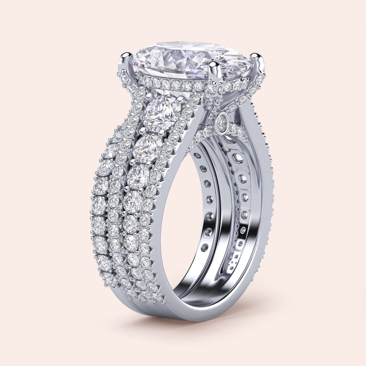 Elegant oval-cut diamond engagement ring withPave-set accents on a 14K/18K gold or platinum band.