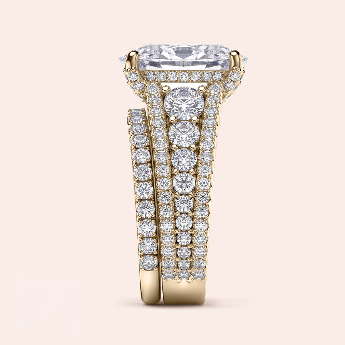 Elegant 14K Yellow Gold Engagement Ring Set with Oval Hidden Halo, Pave Accents & Three Row Band Design.