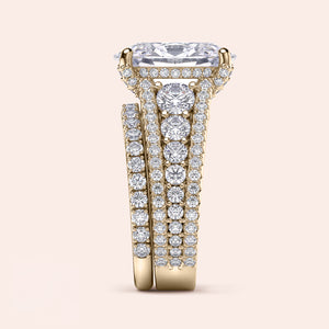 Elegant 14K Yellow Gold Engagement Ring Set with Oval Hidden Halo, Pave Accents & Three Row Band Design.