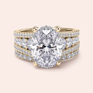 Luxurious 14K and 18K gold or platinum oval-cut diamond ring with pave set band, perfect for elegant and sophisticated occasions.