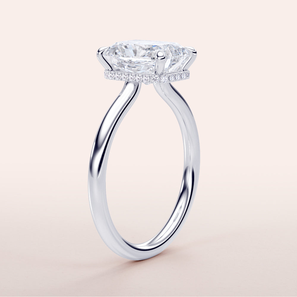 Elegant oval-cut diamond engagement ring in a sleek 14K, 18K, or platinum band, showcasing timeless beauty and sophisticated design.|

#14KRecycledWhiteGold
#18KRecycledWhiteGold








#Platinum