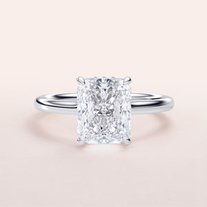 Radiant cut diamond solitaire ring on a sleek 14K white gold band, showcasing timeless elegance and sophisticated beauty.