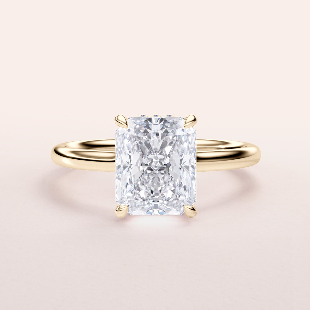 Elevate your style with this elegant 14K gold engagement ring featuring a radiant-cut diamond in a classic solitaire setting.|




#14KRecycledYellowGold
#18KRecycledYellowGold





