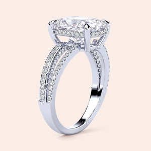 Stunning 14K/18K white gold engagement ring with hidden halo, cushion cut center diamond, andPave band design.