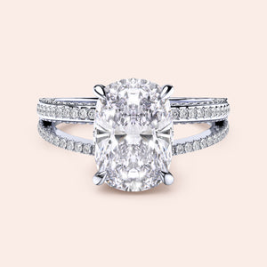 Elegant white gold engagement ring with cushion-cut diamond and hidden halo, available in 14K & 18K gold or platinum.