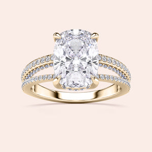 Stunning yellow gold 14K or 18K engagement ring featuring a cushion hidden halo and Pave accents.