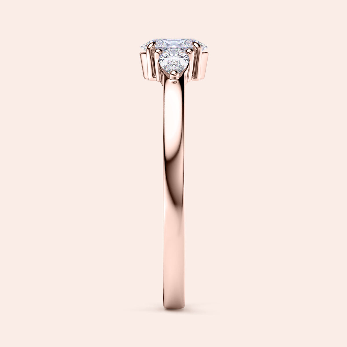 Elegant rose gold engagement ring featuring three side pear stones and an Asscher-cut diamond, available in 14K or 18K gold.