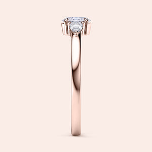 Elegant rose gold engagement ring featuring three side pear stones and an Asscher-cut diamond, available in 14K or 18K gold.