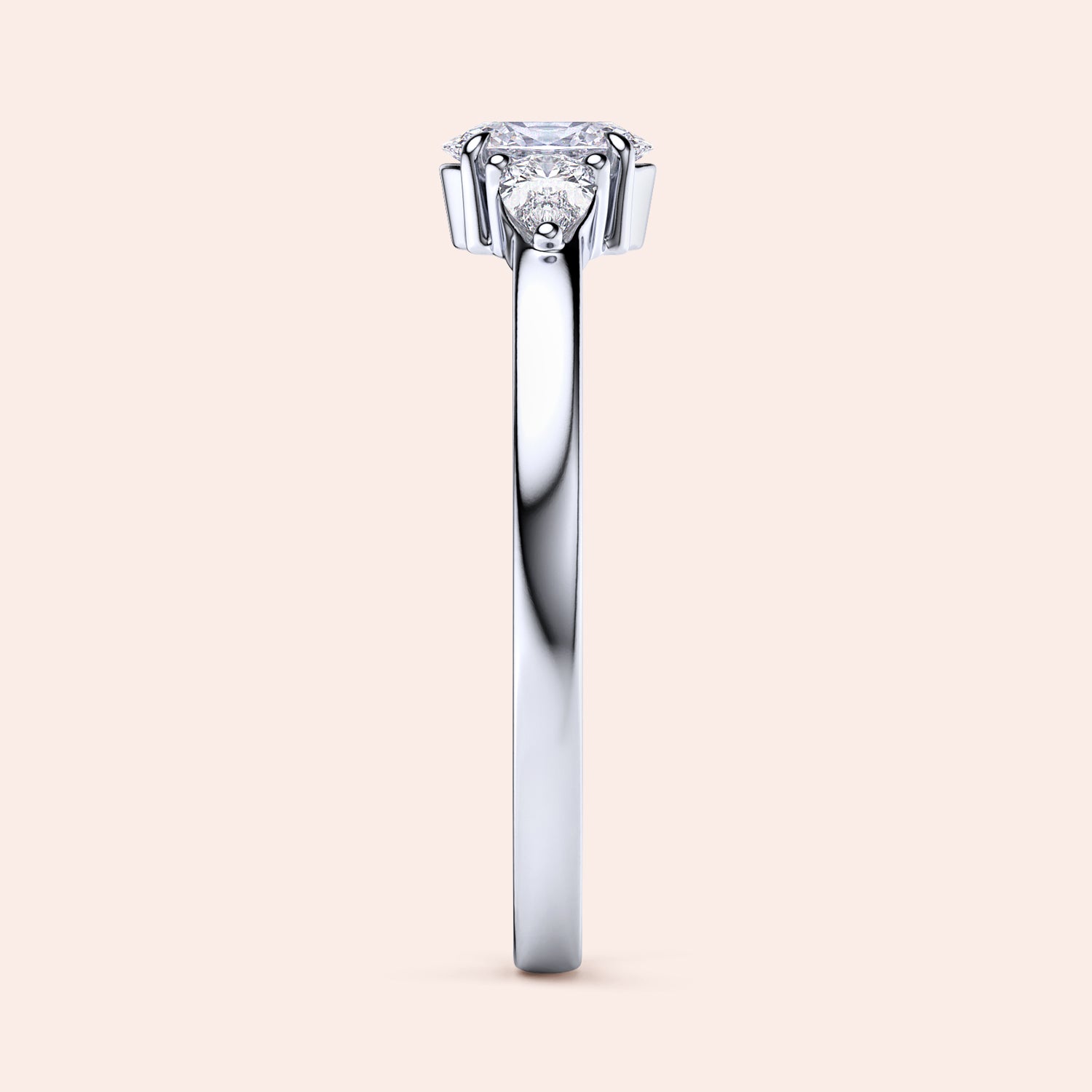 Elegant 14K white gold engagement ring featuring an oval diamond center and two pear-shaped side stones in a three-stone setting.|

#14KRecycledWhiteGold
#18KRecycledWhiteGold








#Platinum