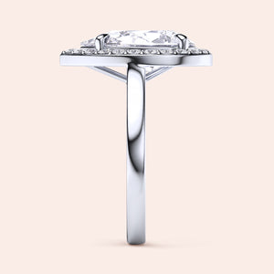 Exquisite pear-shaped diamond engagement ring with halo setting in 14K white gold, showcasing dazzling brilliance.