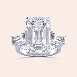 Elegant pear-shaped diamond engagement ring in 14K/18K gold or platinum, featuring a sparkling diamond-studded band.
