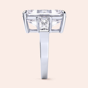 Elegant pear-shaped diamond engagement ring in 14K/18K gold or platinum, featuring a sparkling diamond-studded band.