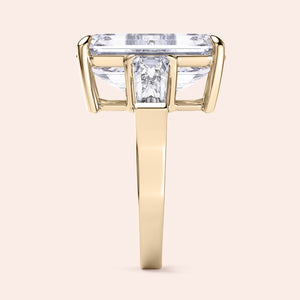Exquisite pear-shaped diamond ring in 14K/18K gold or platinum, adorned with halo diamond accents for an elegant touch.