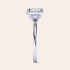 Elegant 14K and 18K white gold east-west oval solitaire engagement ring featuring a heart-shaped diamond, perfect for special occasions.