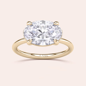 Elegant 14K or 18K gold or platinum oval-cut diamond solitaire engagement ring, showcasing a stunning east-west design.