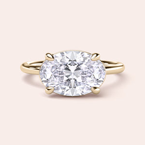 Elegant 14K yellow gold engagement ring featuring an oval diamond, showcasing timeless sophistication for any special occasion.